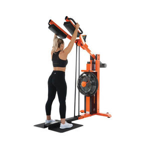 A woman doing a press exercise using the Fluid Power Zone Press